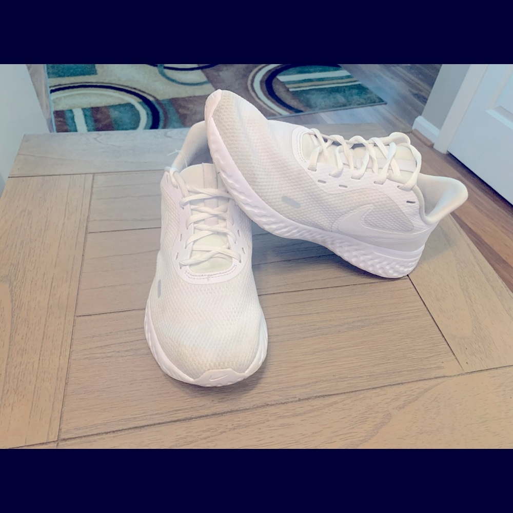 Nike Revolutions White Size 9.5.  Men's.